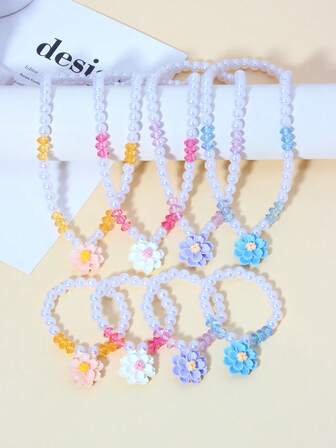 Set de 2 piezas de pulsera y collar con colgante de flor y perlas, adecuado para fiestas, escuela, regalo de cumpleaños para niñas