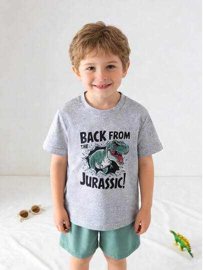 This 2-Piece Set Of And Cute English Cartoon Dinosaur Pattern Short-Sleeved T-Shirt And Shorts For Young Boys Is Perfect For Spring And Summer. Made Of Soft, Stretchy, And Comfortable Knit Fabric, It Has A Casual, Vacation Vibe And Is Suitable For Outdoor Activities, School, Cycling, Running, Holidays, Parties, And Everyday Casual Wear.