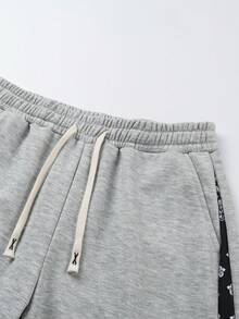 男士抽绳松紧腰宽松阔腿裤，饰有腰果花拼接细节，街头休闲运动裤，适合春秋季日常穿着、聚会和度假。 - 淺灰色 - 查看 4