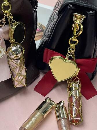 1 pièce Porte-rouge à lèvres en métal doré avec poche en filet remplaçable en acier inoxydable, pendentif nœud, plusieurs styles disponibles, étui à rouge à lèvres avec décoration cœur et étoile, porte-clés avec mini miroir, décoration suspendue pour baume à lèvres et cosmétiques, pendentif de sac pour sacs à main et portefeuilles, accessoire de maquillage portable pour femmes, filles, amateurs de beauté et cadeau