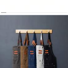 一件防水防油围裙，男女通用，配有方便的口袋——非常适合在超市、餐厅、水果店、奶茶店等场所使用。