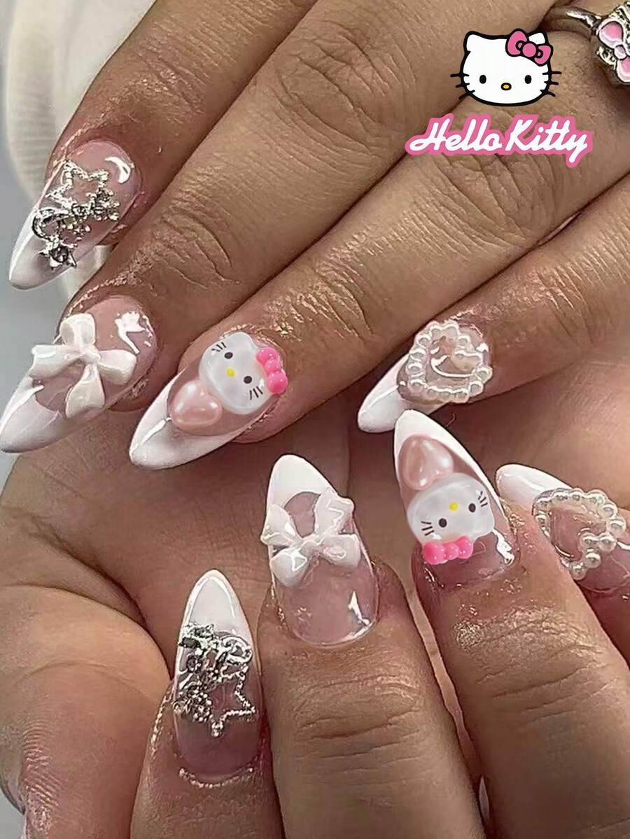 SANRIO 24片Y2K风格长杏仁白色法式美甲贴纸，饰有可爱爱心、珍珠、金属星星和粉色蝴蝶结，适合日常派对使用，包含1瓶果冻胶和1个指甲锉 - 彩色 - 查看 1
