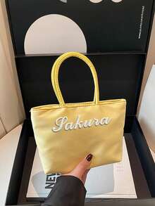 定制刺绣新款小众迷你糖果色手提包，女士尼龙面料通勤托特包，方便携带，适合作为生日或新年礼物送给朋友、女朋友、闺蜜。