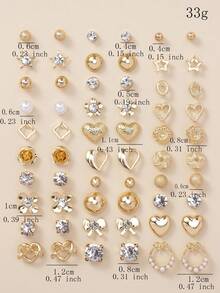 一套30对简约时尚的耳钉，饰有可爱的星星和蝴蝶结图案，款式多样。这些金属仿珍珠耳钉适合作为女士的节日礼物，也适合日常休闲佩戴。 - 金黃色 - 查看 5