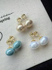 3 đôi bông tai đính ngọc trai giả kiểu dáng retro dễ thương, đơn giản, ngọt ngào với ba màu trắng, xanh dương và nâu nhạt, nhẹ nhàng, sang trọng, thanh lịch, thích hợp cho cả đi làm và đi chơi, dành cho phái nữ. - Bộ đồ A - Xem 2