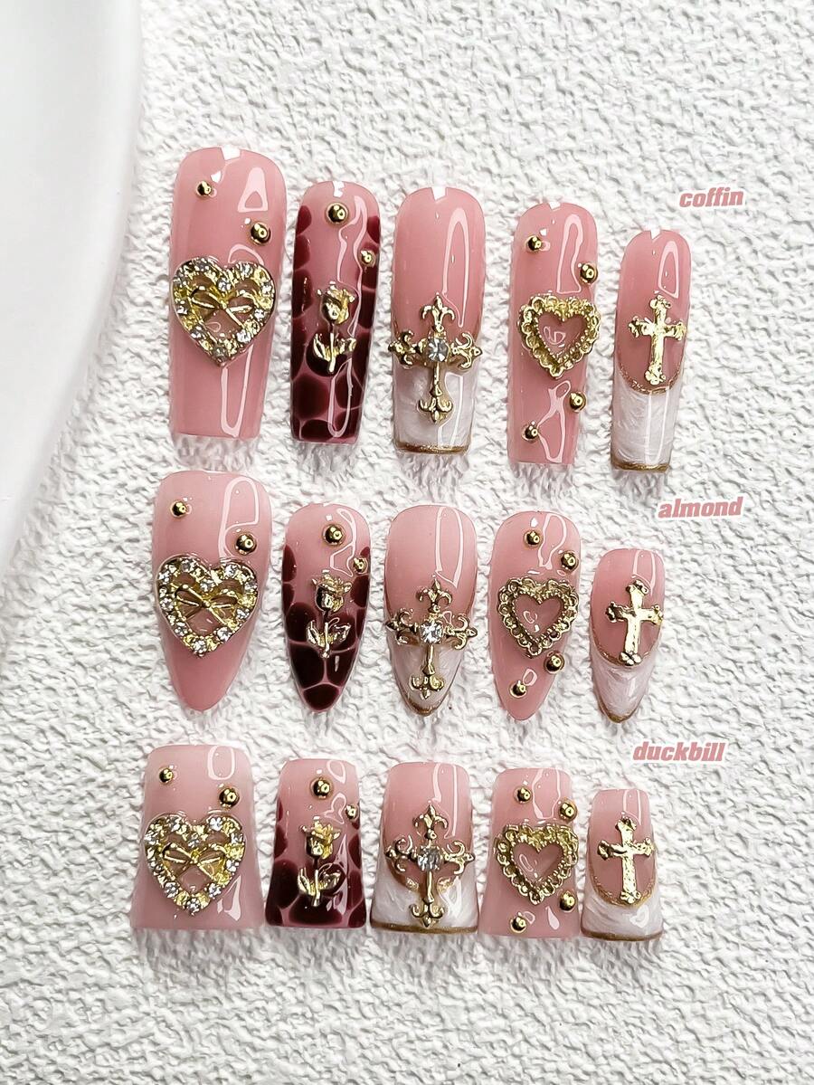10片欧美风美甲贴纸，包含金色十字架、镂空爱心、玫瑰、蝴蝶结等美甲配件，不对称金色水钻设计，手工绘制金边，红白指甲油，附赠美甲工具（1片果冻贴纸+1把指甲锉），3种尺寸可选，杏仁形美甲贴片，手工按压式美甲。 - 彩色 - 查看 1