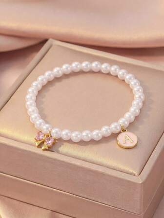 1 st sött elegant mode belagd zirkonia rosett & rund engelsk initial berlock pärlpärlor armband barn, flickor, familj, vänner, sommar, resor, gatumode enskilda smycken, lämplig för daglig dekoration, högtidsfödelsedagspresent, barnsmycken