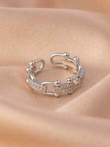 1枚马蹄形搭扣简约设计锆石实心戒指，奢华配饰，男女皆宜，适合日常和节日佩戴。