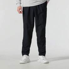 Under Armour Solid Color Drawstring Mid-Rise Casual Trousers For Men.