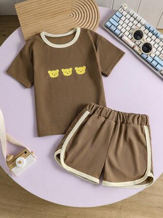 Set de 2 piezas de manga corta y pantalones cortos para niño pequeño, textura de gofre y estampado de 3 osos de dibujos animados, para el verano 2025