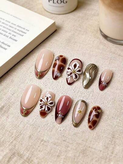 10pcs Handmade Almond-Shaped Brown Leopard Print Metal Flower Nail Stickers. These Handcrafted Nail Stickers Feature Amber-Colored 5-Petal Flowers, Hand-Painted Leopard Print, Gradient French Tips, And Golden Circular Lines - An Elegant, Romantic Yet Minimalist Design That Exudes A High-End, Sexy, And Luxurious Appeal. Ideal For Daily Wear, Dates, Concerts, And Light Business Occasions, Making It A Wonderful Gift For Women And Girls. Nails