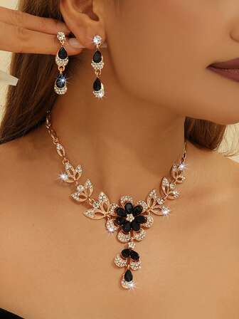 1 Set de Joyería Dorada con Flor Hueca y Cristal Negro, Collar y Aretes para Mujer