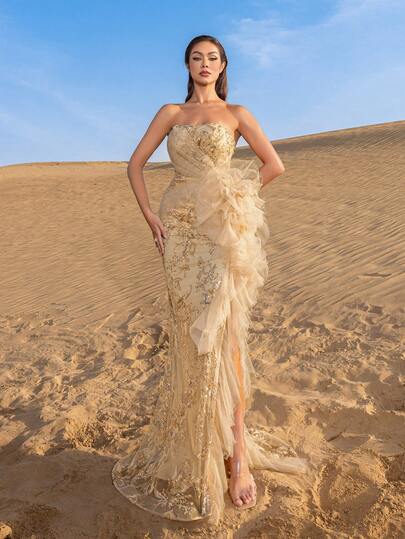 Faeriesty 这款奢华的无肩带美人鱼晚礼服，饰以精美的花卉串珠刺绣和多层雪纺荷叶边下摆，侧开衩设计凸显腿部线条，适合优雅的婚礼、盛大晚宴和花园派对。
