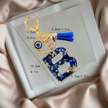 1pc Navy Blue Resin First Initial Letter Key Chain With Devil's Eye And Tassel, Outdoor Backpack Hanging Accessory, A-Z Letter Keychain, Wallet Charm, Car Pendant Ornament, Holiday/Birthday Party Gift - Royal Blue - View 3