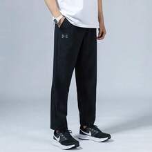 Under Armour Solid Color Drawstring Mid-Rise Casual Trousers For Men.