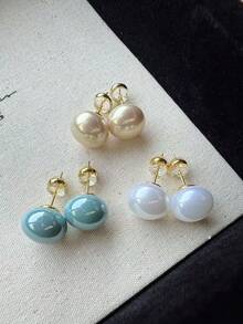 3 đôi bông tai đính ngọc trai giả kiểu dáng retro dễ thương, đơn giản, ngọt ngào với ba màu trắng, xanh dương và nâu nhạt, nhẹ nhàng, sang trọng, thanh lịch, thích hợp cho cả đi làm và đi chơi, dành cho phái nữ. - Bộ đồ A - Xem 8