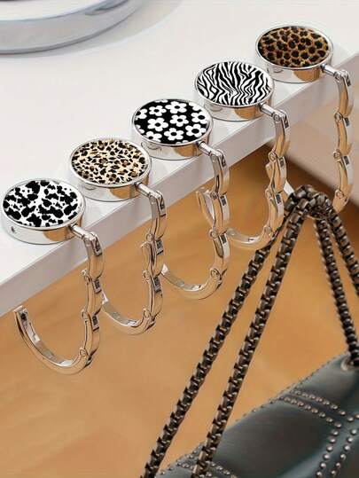 1pc Leopard Print Black Geometric Pattern Zinc Alloy Wallet Hook, Casual Folding Handbag Stand, Portable Desktop Holder, Suitable For Home And Retail Use