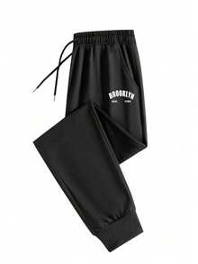 男士纯色简约针织裤，时尚百搭，适合运动和休闲场合，款式多样，穿着舒适。女士们可以把它作为礼物送给男友或丈夫，这将是一份很棒的礼物。 - 黑色 - 查看 2