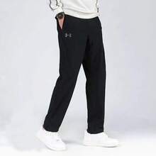 Under Armour Solid Color Drawstring Mid-Rise Casual Trousers For Men.