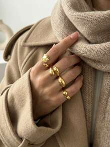 Set de 4 anillos apilables de tono dorado clásico - Anillos de nudillo geométricos lisos con forma de lágrima y redondos - Accesorios de joyería de oficina y casual para mujer