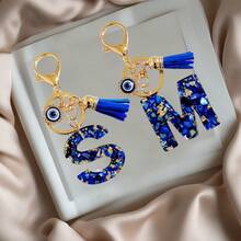 1pc Navy Blue Resin First Initial Letter Key Chain With Devil's Eye And Tassel, Outdoor Backpack Hanging Accessory, A-Z Letter Keychain, Wallet Charm, Car Pendant Ornament, Holiday/Birthday Party Gift - Royal Blue - View 1