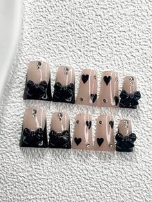 10pcs Minimalist French Nail Stickers Set, Acrylic Nail Art Kit, Hand-Painted Black Heart Nail Decor, Black Bow, White Rhinestone Nail Accessories, Black Nail Polish, Includes Nail Tools (1 Jelly Sticker + 1 Nail File), 3 Sizes Available: Almond, Duck Mouth, Great Gift For Women & Girls, Suitable For Commuting, Party, Play, Photography, Winter Daily Vacation, Etc. Nails Nail Supplies Handmade Press On Nails - 彩色 - 查看 13