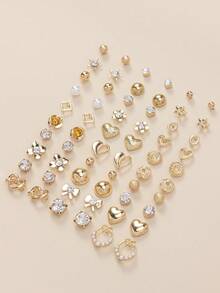 一套30对简约时尚的耳钉，饰有可爱的星星和蝴蝶结图案，款式多样。这些金属仿珍珠耳钉适合作为女士的节日礼物，也适合日常休闲佩戴。 - 金黃色 - 查看 4