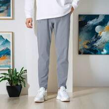 Under Armour UA Out The Storm Solid Color Stretch Woven Running Pants, Men's, Grey - Light Grey - View 1