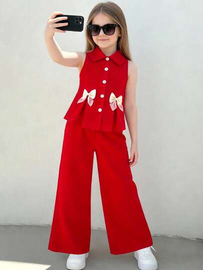 2-delars söta och söta flickkläder, fin ärmlös topp med rosett + lösa byxor med vida ben, lämplig för utflykt, födelsedagsfest, vardagskläder