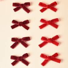 8个红色迷你蝴蝶结发夹，适合日常佩戴