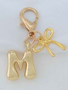 1个A-Z金色泡泡字母可爱吊坠，蝴蝶结装饰，钥匙扣，戒指托，背包挂饰，汽车挂饰，购物，海滩，露营，钱包配饰。适合作为送给女性、朋友和学生的礼物，时尚创意设计，生日礼物装饰，圣诞礼物。 - 金色蝴蝶結 - 查看 8