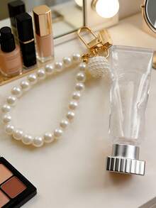 1支透明空唇膏管，牙膏形状，带珍珠钥匙扣吊坠，透明冰块形唇膏空管，独立包装，可填充唇膏管，旋转式外壳，塑料材质，挤压式出液口，旋转式盖子，旅行必备，美容工具，塑料材质，方便携带和送礼，适合派对和节日礼物