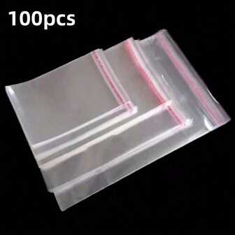 100 st. transparenta OPP-förpackningspåsar, stora självtätande glaspapperspåsar, självhäftande, transparenta och återförslutningsbara glaspappersplastpåsar, används för förpackning av kläder, t-shirts, byxor, accessoarer