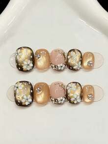 10片装短款椭圆形手工美甲贴片，适合派对和日常佩戴，金色美甲贴片，美丽的山茶花图案，椭圆形美甲贴片。闪亮耀眼，易于佩戴。10片装Y2K风格手工美甲贴片，适合女孩和女士在节日派对和日常佩戴。美甲用品。手工美甲贴片 - 金色 - 查看 8