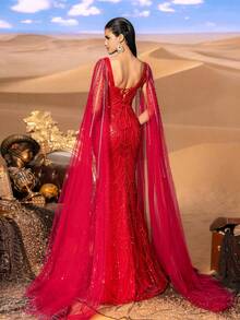 Faeriesty Chiếc đầm dài dáng đuôi cá cổ vuông đính hạt lấp lánh dành cho phái nữ, kết hợp với khăn choàng lưới dài mỏng manh, có phom dáng ôm sát và được thêu pha lê tinh tế, phù hợp cho các sự kiện thảm đỏ, tiệc tối trang trọng, đám cưới, lễ trao giải sang trọng, chụp ảnh thời trang cao cấp và các dịp trang nhã khác. - Đỏ - Xem 2