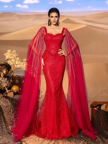 Faeriesty Chiếc đầm dài dáng đuôi cá cổ vuông đính hạt lấp lánh dành cho phái nữ, kết hợp với khăn choàng lưới dài mỏng manh, có phom dáng ôm sát và được thêu pha lê tinh tế, phù hợp cho các sự kiện thảm đỏ, tiệc tối trang trọng, đám cưới, lễ trao giải sang trọng, chụp ảnh thời trang cao cấp và các dịp trang nhã khác. - Đỏ - Xem 3