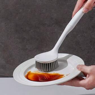 1个隐藏式挂绳方便排水的极简设计清洁锅刷，刷毛浓密，符合人体工程学的手柄，美观大方