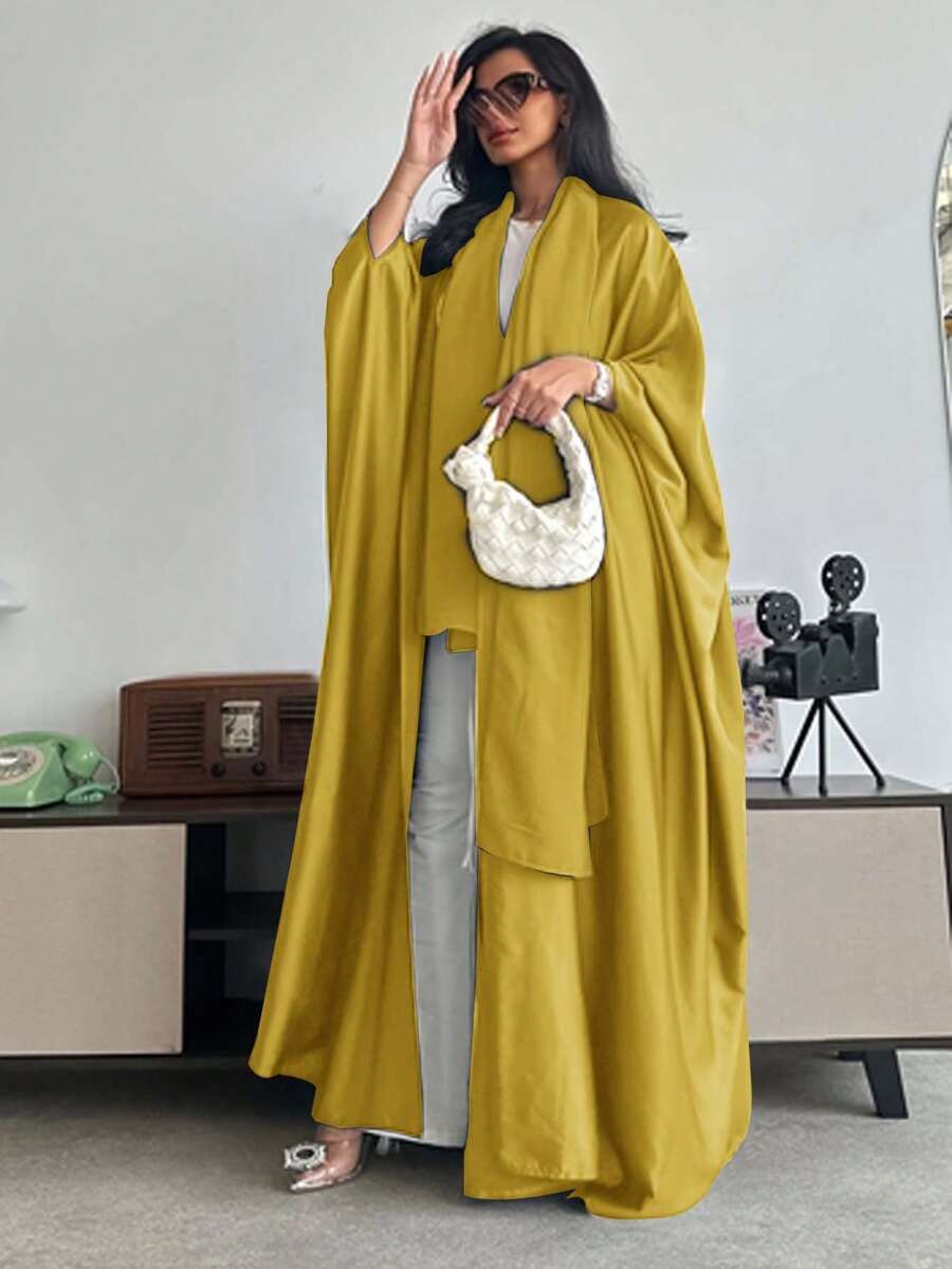 Conjunto de túnica holgada de color liso con mangas de murciélago y pañuelo de estilo árabe, atuendo primaveral y otoñal