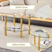 Modern Two-Tiered Glass Coffee Table With Gold Metal Legs, Stable And Spacious, With A Light And Luxurious Design. The Metallic Sheen And The Reflections Of The Glass Harmonize Beautifully To Create Interiors Of Understated Luxury.