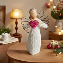 红心女孩，手绘树脂立像，天使双手捧着一颗红心，寓意“你被爱着”，表达爱与关怀，适合作为婚礼、周年纪念日或情人节礼物。 - 白色 - 查看 2