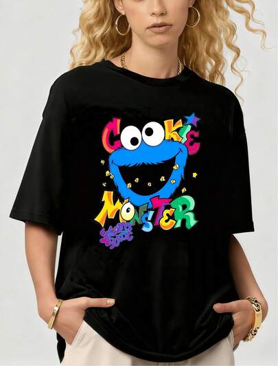 T-shirt à manches courtes en coton graphique rétro amusant et coloré du monstre de miettes de