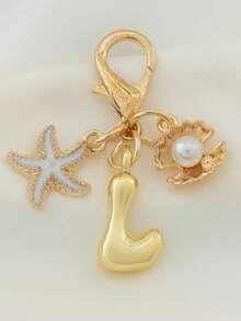 1个A-Z字母金色泡泡字母吊坠钥匙扣，饰以海星和贝壳配件，可用作钥匙扣、戒指、包包挂饰、背包挂件、汽车挂件，非常适合购物、海滩、露营、钱包和手提包，是送给女性、朋友、学生的理想礼物，时尚创意设计，生日礼物、夏季包包挂饰、万圣节配饰、教师节礼物。 - 彩色 - 查看 4