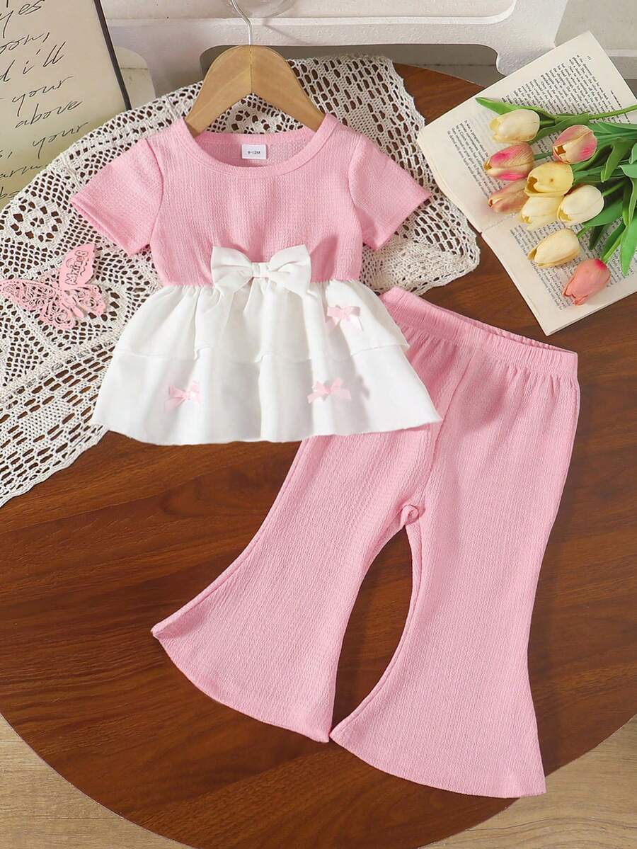 2pcs Girls Toddler Casual Bow Decor Soft Knitted Jacquard Short Sleeve Top And Flare Pants Set, Suitable For Outdoor Wear, Spring/Summer - Pink - View 1