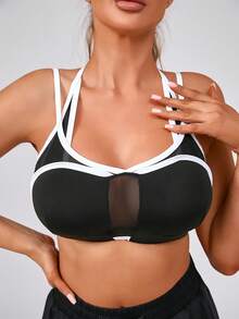 حمالة صدر رياضية نسائية من الشبك والقطن قابلة للإزالة والتعديل، بتصميم قطعتين متداخلتين باللون الأسود - الأسود - مشاهدة 4