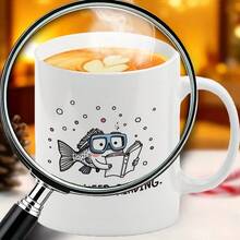 1pc, 11oz, Ceramic Coffee Mug, Fish Reading Pattern Fun Mug, Dishwasher , Ideal Gift For Family/Friends/Colleagues, Perfect For Holiday/Party/Birthday Presents, Suitable For Book Lovers, Book Stack Mug, Office Mug, Party Favors, Quirky Design, Novelty Coffee Cup, Smooth Glaze, Sturdy Construction, Unique Coffee Cup, Collectible Mug, Office Workers, Gift Shoppers - Light Blue - View 2