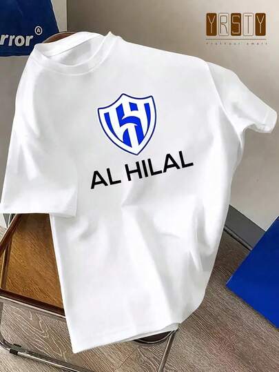 Camiseta Casual de Cuello Redondo para Hombre con Impresión de Letras "AL HILAL" - Suave, Lavable a Máquina, Comodidad para Todas las Estaciones, Ajuste Regular, Versátil para Atuendo Casual, Camiseta de Uso Diario |   Camiseta con Letras Negritas |   Ajuste cómodo