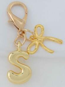 1个A-Z金色泡泡字母可爱吊坠，蝴蝶结装饰，钥匙扣，戒指托，背包挂饰，汽车挂饰，购物，海滩，露营，钱包配饰。适合作为送给女性、朋友和学生的礼物，时尚创意设计，生日礼物装饰，圣诞礼物。 - 金色蝴蝶結 - 查看 7