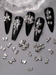 Bộ 88 chiếc nơ ruy băng nhiều màu sắc phong cách Y2K, nơ ruy băng 3D đế hợp kim tối giản thời trang Nhật Bản & Hàn Quốc, trang sức móng tay phong cách Punk đen tối, trang trí móng tay kết hợp nơ dập nổi 3D, phụ kiện trang trí móng tay và ốp điện thoại DIY thủ công, trang sức móng tay, dụng cụ làm móng, đá đính móng và quà tặng trang trí móng tay. - Bạc - Xem 4