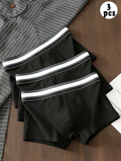 三条黑色、灰色和白色腰带的纯色男士平角内裤，男士内衣，圣诞服装