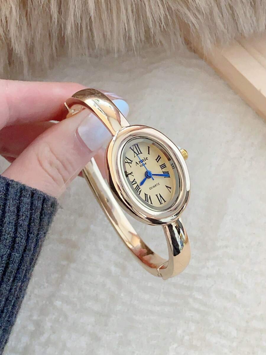 1件金色手镯式女士石英表，罗马数字刻度，精致简约，适合日常佩戴，也可作为生日/毕业礼物或派对礼物。 - 金色 - 查看 1